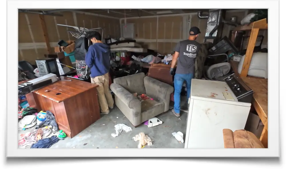 two man cleaning junk furniture