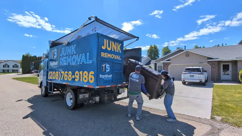 furniture removal put in blue top shelf truck