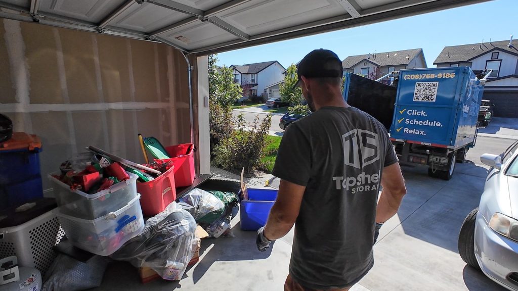 Challenges and Solutions in Estate Cleanout Projects An estate cleanout will test your patience, your lower back, and your family group chat. The house won’t argue less because you’re grieving. It argues because stuff is loud. The way through isn’t martyrdom; it’s a plan that respects time, feelings, and physics. Here’s how to turn the mess into motion, one hard thing at a time. Dealing with Emotional and Sentimental Attachments Feelings slow hands. Accept that, then design around it. What makes it hard Every object is a story and your brain wants to hear it—again. Guilt dresses up as obligation: “We should keep this because…” Decision fatigue turns “yes/no” into “maybe later,” which means “carry it twice.” What works The 24-Hour Bin: One labeled tote for “decide tomorrow.” If it’s still undecided tomorrow, it’s really a no. One-Bin Memory Rule: Each immediate family member gets a single keepsake bin with a lid. Boundary, not a storage unit. Photograph, then release: Snap the heirloom doily on Nana’s table. Keep the photo. Let the doily go. A/B choices only: Keep/Donate. No “Maybe” mountain. The Last Look Walk-through: At the end, one slow lap with tissues. Honor the house, not the pile. Script when emotions stall the room: “We’re honoring the memories, not the mass. One bin each. Everything else finds its next life.” Strategies for Handling Hoarded Properties Hoarding is not “more stuff.” It’s different work with different risks. Reality check Pathways are compromised; floors may not be floors. Biohazards happen: mold, pests, sharps, human/animal waste. Hidden structural issues: soft subfloors, overloaded shelves, blocked vents. Game plan Safety first: nitrile gloves, heavy gloves, P100 respirators, goggles, long sleeves, puncture-resistant shoes. Tetanus up to date. Two-lane sorting: Keep/Dump only for the first pass; refine later. Momentum beats perfection. Top-down, front-to-back: Clear ceilings/shelves before stacks. Open escape routes. Sharps protocol: Rigid containers for needles/blades; treat any bag as a maybe-sharp until proven otherwise. Stage outdoors: Fresh air = fewer risks. Tents/tarps for weather. Professional backup: Call in pros for heavy biohazard, animal waste, or structural concerns. Pride is not PPE. Progress metric: square feet of safe floor reclaimed per hour, not boxes filled. Navigating Complex Family Dynamics and Disputes The stuff isn’t the only tangle. People are. Where it breaks Heir A wants speed, Heir B wants maximum value, Heir C wants to re-live third grade. “Verbal wishes” appear at convenient moments. Group texts turn into courtrooms without judges. How to keep moving One Decider: Executor/administrator = final call. Put it in writing. Time-Out Table: Any disputed item lands here with a sticky note. Decider rules once per day. No aisle debates. Rules on the Wall: Keep/Donate/Sell/Recycle/Trash, one memory bin per person, 24-hour bin. Signed by all. Transparency kit: Shared folder with photos, receipts, dump tickets, donation acknowledgements, and a daily status note. Sell-fast policy: If it won’t sell in 7 days via local auction/marketplace, it becomes a donation candidate. Private grief, public work: When someone needs a minute, they take it—in a different room—while the work continues. Boundary line you can use: “We will treat every memory with respect and every decision with finality.” Addressing Environmental and Safety Hazards A cleanout is a jobsite. Treat it like one. Common hazards Air: dust, mold, rodent droppings, nicotine residue. Materials: sharps, broken glass, chemicals, gasoline, propane. Structure: soft floors, loose railings, overloaded attic joists. Utilities: live outlets, gas appliances, leaking water lines. Controls that matter PPE standard: safety glasses, P100 respirators, cut-resistant gloves, steel-toe shoes. Wet methods: mist dusty areas; never dry-sweep mouse droppings. Electric sanity: GFCI on tools, testers for outlets, no daisy chains of cracked orange cords. Chemical triage: segregate paints/solvents/batteries/propane for HHW disposal; never into the dumpster. Load limits: one person per attic joist bay; lay boards if you must be up there. Exit clear: the path to the door stays holy—no stacking “for a second.” If you suspect asbestos, substantial mold, or anything that makes your gut say “nope,” pause and bring in qualified help. Courage doesn’t filter spores. Adapting to Timelines and Emergencies Deadlines don’t care about your ideal plan. Build a resilient one. Typical squeezes Listing photos in 72 hours. Landlord turnover by month-end. Travel windows and probate milestones colliding. How to bend without breaking Back-plan from the immovable date: book donation pickups, container swaps, and e-waste/HHW drop-offs first; fill sorting around them. Two-pass approach: Pass 1 clears surfaces and trash; Pass 2 refines (donate/sell/recycle). A half-empty house photographs 10x better than a perfect closet. Parallelize: One runner handles donation/HHW runs while the crew keeps sorting. Contingency kit: spare keys, extra locks, floor protection, contractor bags, labels, batteries, headlamps, and a printed “who to call” sheet. Decision escalations: pre-authorize small spend thresholds (“Yes up to $___ for hauls/tools without group approval”). Plan B vendors: a second dumpster company, an alternate donation center, and a same-day junk hauler contact. Daily micro-plan (stops panic): Today’s three wins Blockers + owner of each Receipts uploaded Tomorrow’s first task at the door before you leave Bottom line Estate Cleanout Projects